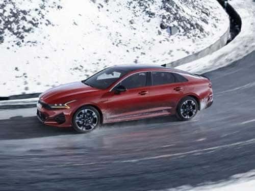 2025 Kia K5 driving in snow