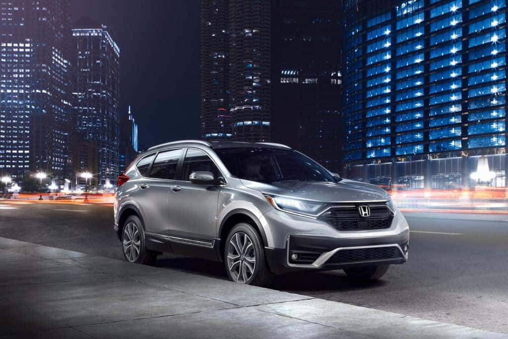 2022 Honda CR-V Touring silver city at night