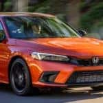 2022 Honda Civic Hatchback driving down street