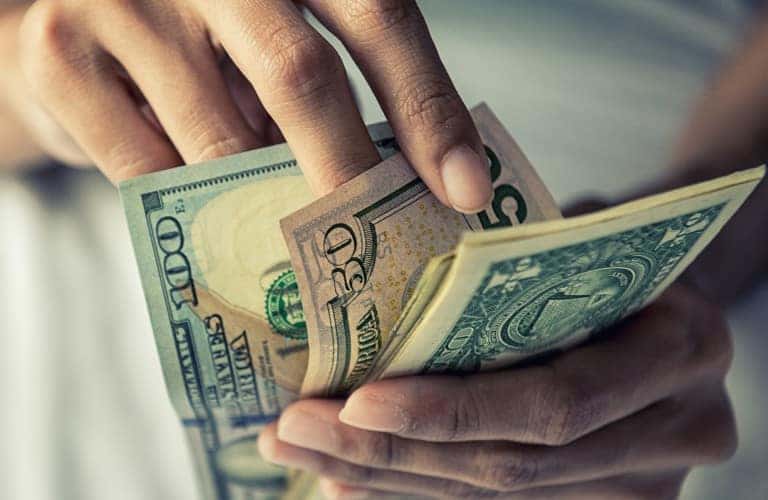 hands counting money