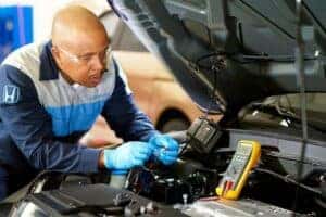 Honda Service Professional Performing a Tune-Up