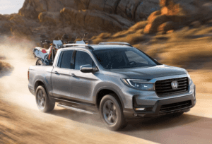Honda Ridgeline Driving Through a Desert