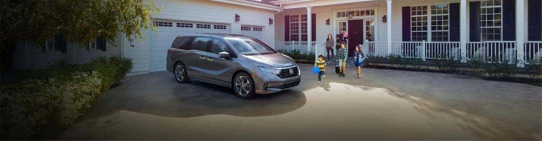 family going out to their honda odyssey