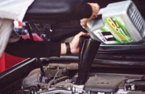 Mechanic Changing Engine Oil