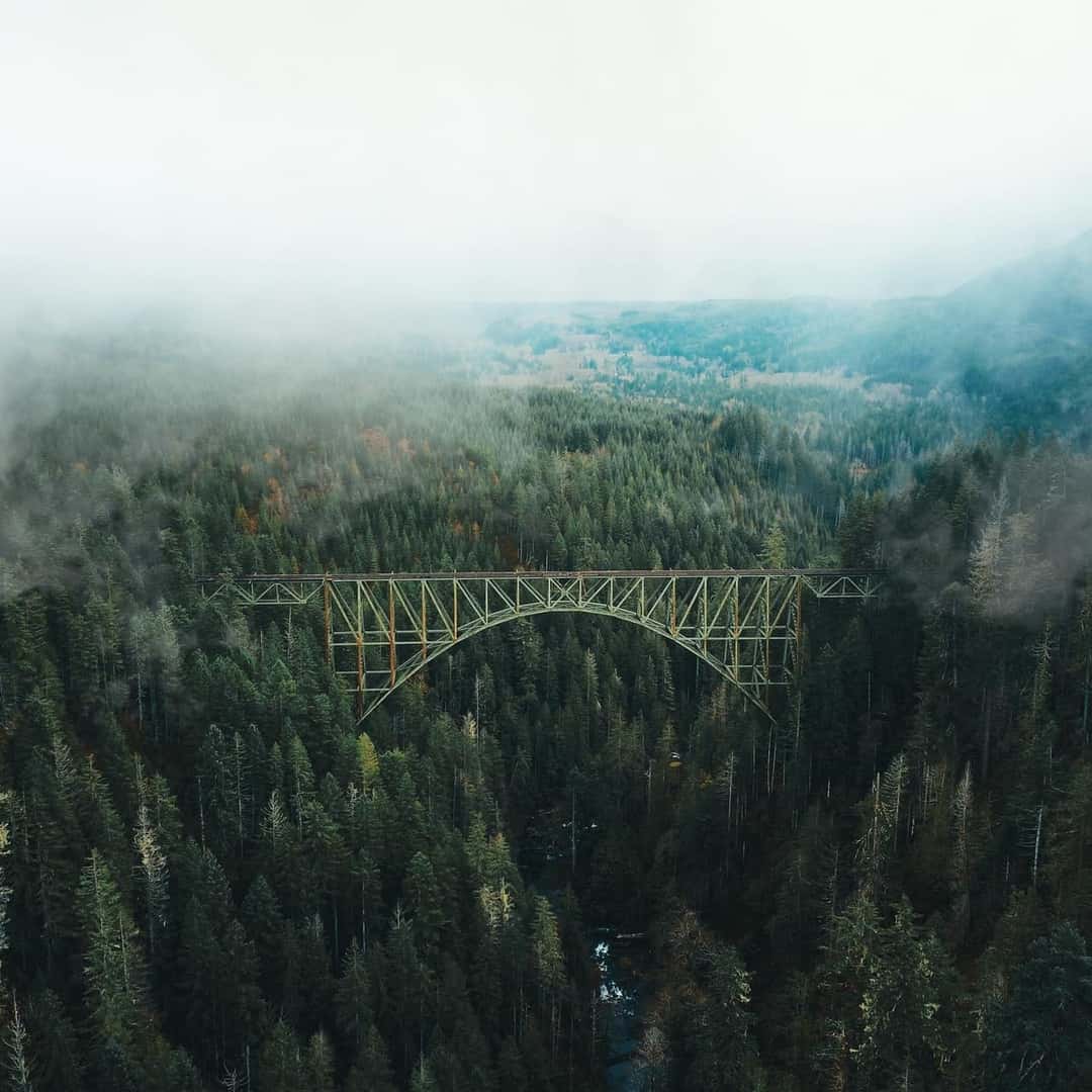 Photo of bridge under clouds