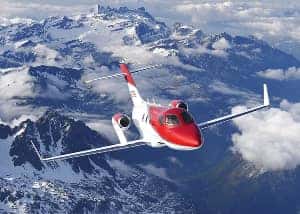 HondaJet Flying Above Mountains