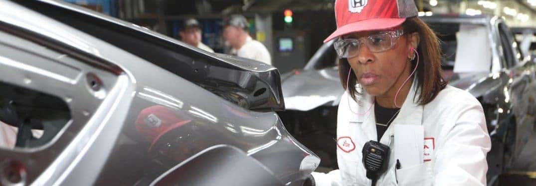 honda auto worker inspecting a car