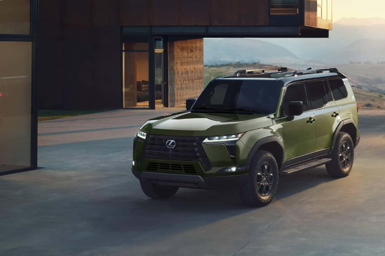 green 2026 lexus gx parked in front of house