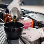 Mechanic Changing Oil