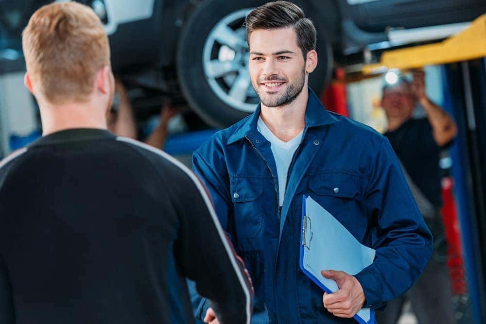 Handsome auto service mechanics
