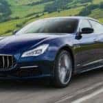 A 2020 Maserati Quattroporte with the Maserati logo on the front grille