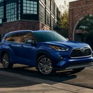 2026 Toyota Highlander Hybrid Driving through the City