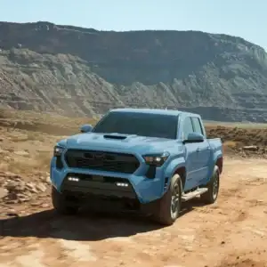 2026 Toyota Tacoma in Heritage Blue Parked Off-Road
