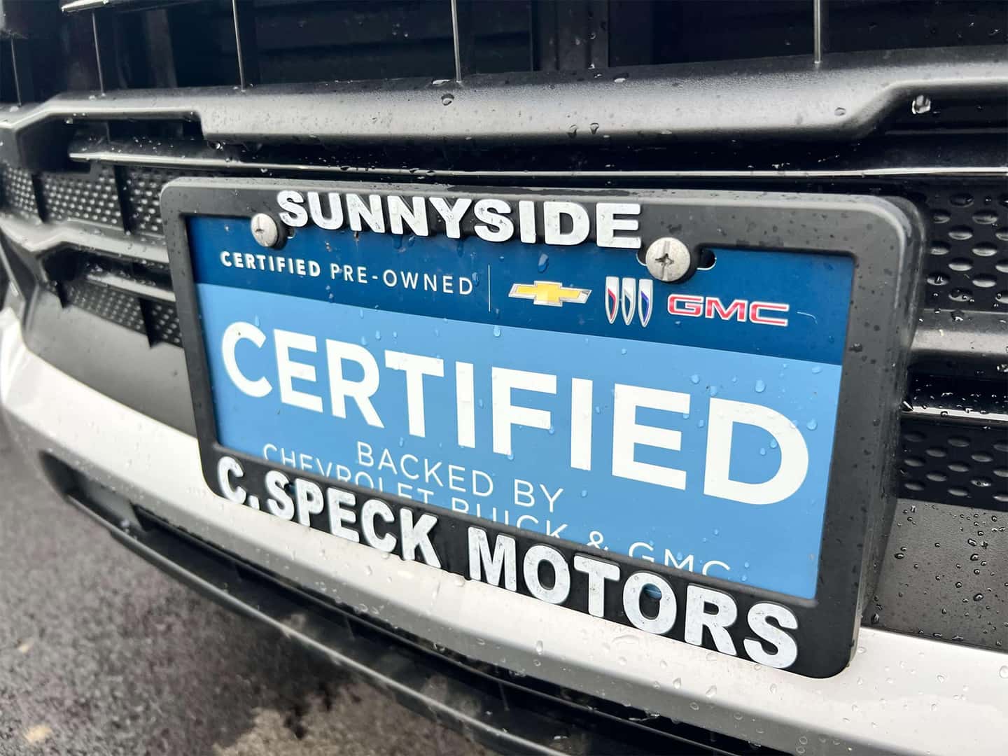 An image of a certified pre-owned license plate