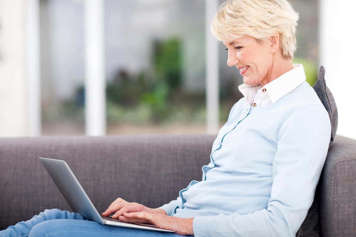 A woman scheduling delivery of her new car