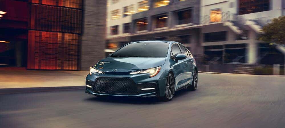 Blue 2020 Toyota Corolla making a right turn