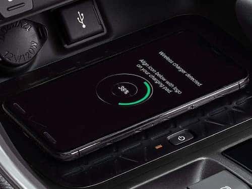 2024 Toyota RAV4 close up view of phone on wireless charger