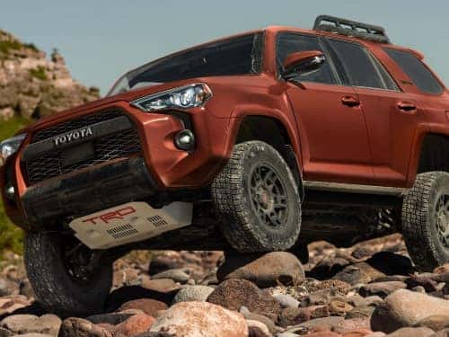 2024 Toyota 4Runner driving over large rocks