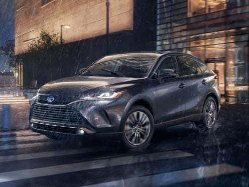 2024 Toyota Venza driving in the rain at night