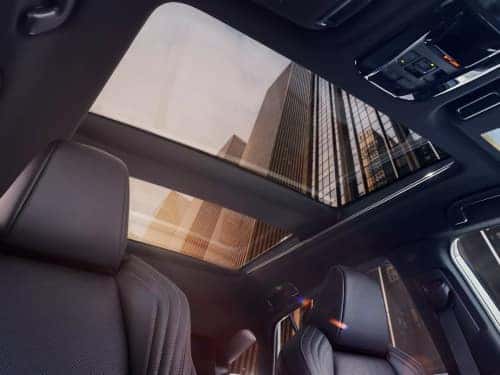 2024 Toyota Venza interior view looking up at open sunroof